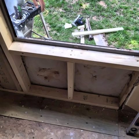 A window opening rebuilt and framed ready for a new unit